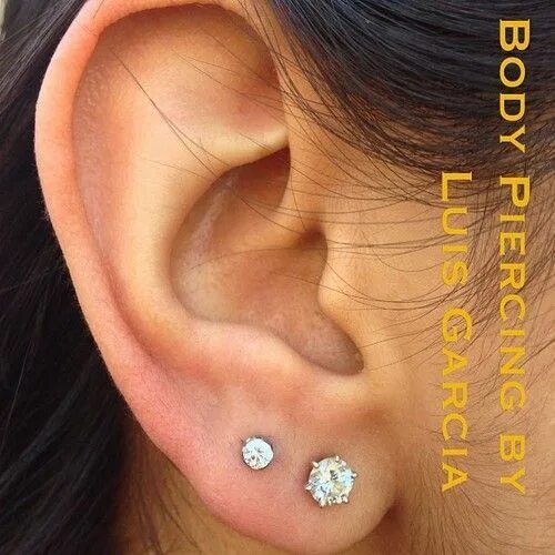 Прокол ушей 4 дырки фото Fresh second earlobe piercing with Anatometal 3mm prong set CZ (at NoKaOi Tiki T