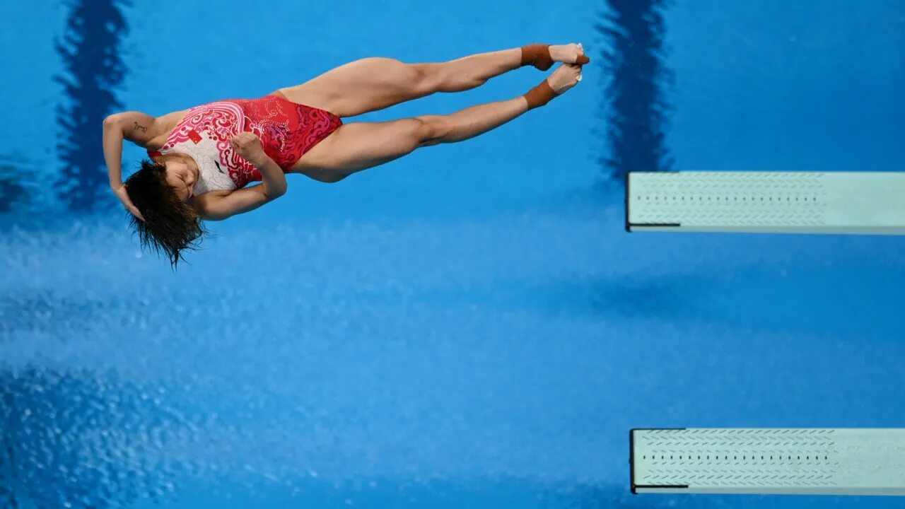 Прыжки в воду женщины фото Olympics-Diving-Dominant Shi doubles up again with 3m springboard gold Nippon.co