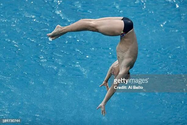 Прыжки в воду женщины фото Illya Kvasha of Ukraine competes in the Men's Diving 3m Springboard... News Phot