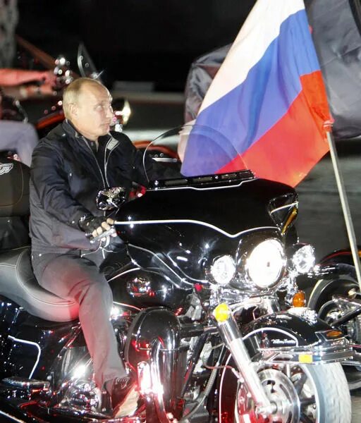 Путин на мотоцикле фото Putin rides with 'Night Wolves' at bike festival World chinadaily.com.cn