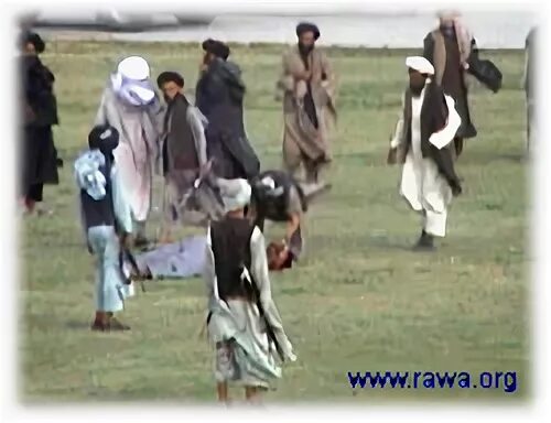 Пытка тюльпан фото Taliban Publicly Cut Throat of Victim (with photos)