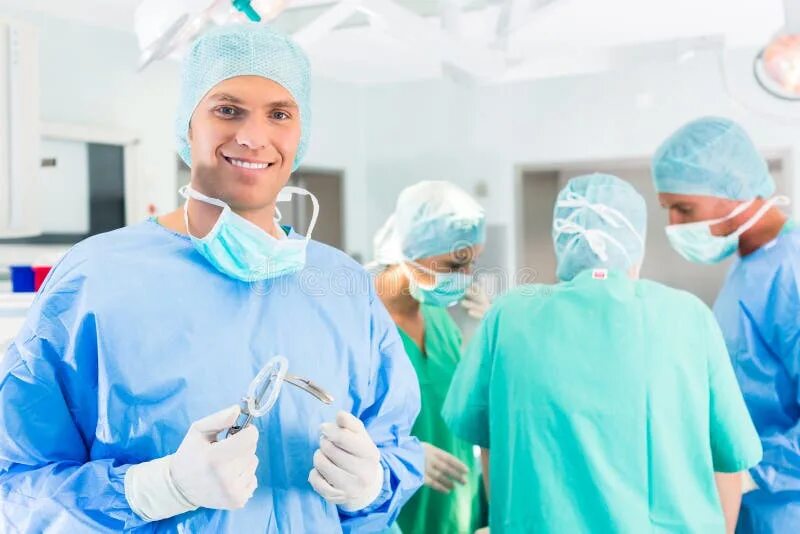 Работа хирургов фото Hospital Surgeons Operating in Operation Room Stock Image - Image of professiona