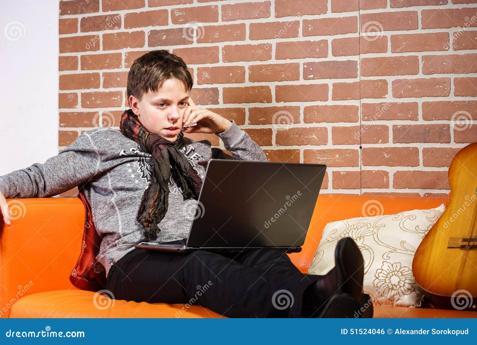 Работа подростков фото Teenage Boy Working on Laptop. Concentration and Composure Stock Photo - Image o