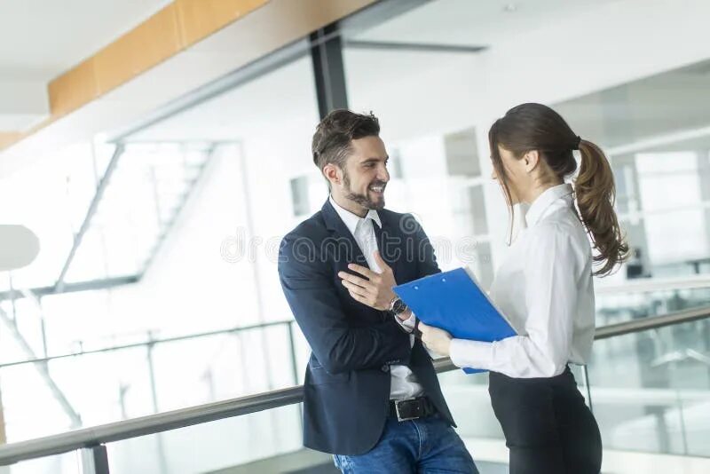 Работа в парах фото Young couple in the office stock photo. Image of personal - 53444368