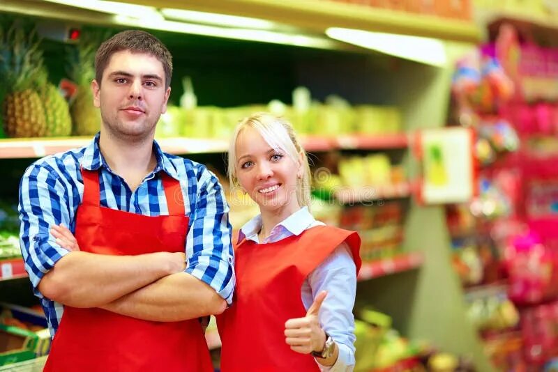 Работник зала картинка Smiling Grocery Staff Working in Supermarket Stock Photo - Image of cabbage, fre