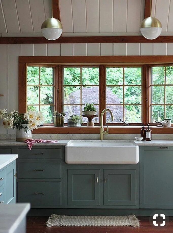 Раковина у окна в доме фото Blue Gray Cabinets. White Paneling. Stained Wood Trim. Rustic kitchen cabinets, 