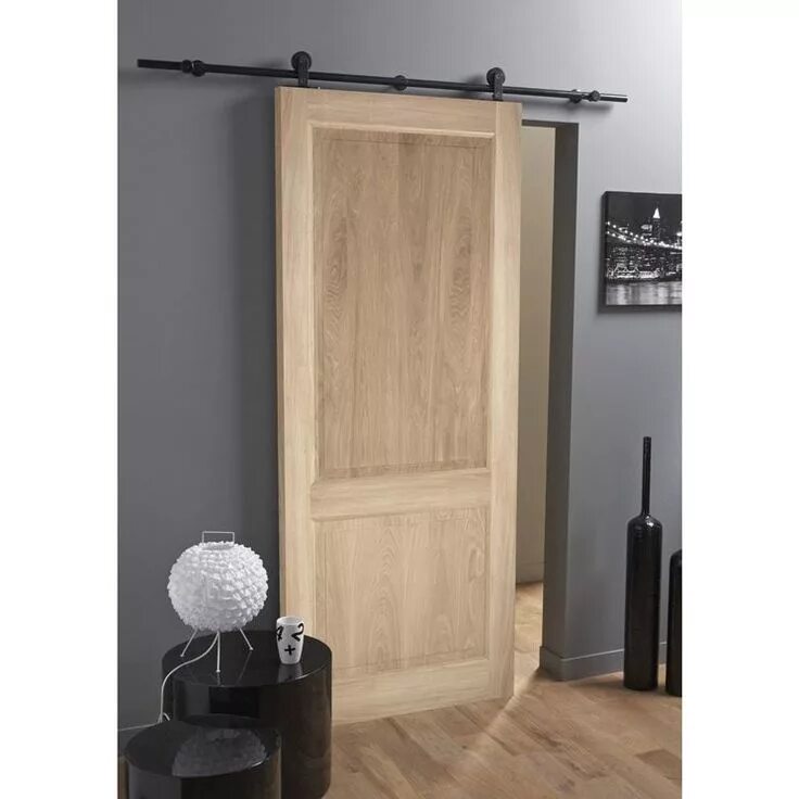 Très belle porte en bois plein et alu noir pour un effet industriel Leroy Merlin