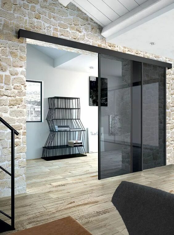 Раздвижные двери в стиле лофт smoked glass sliding doors stand out in stone clad giving it a fresh and more mo