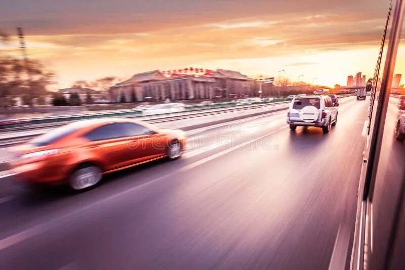 Размытое фото машины Car Driving on Freeway at Sunset Stock Image - Image of cloud, freight: 53105087