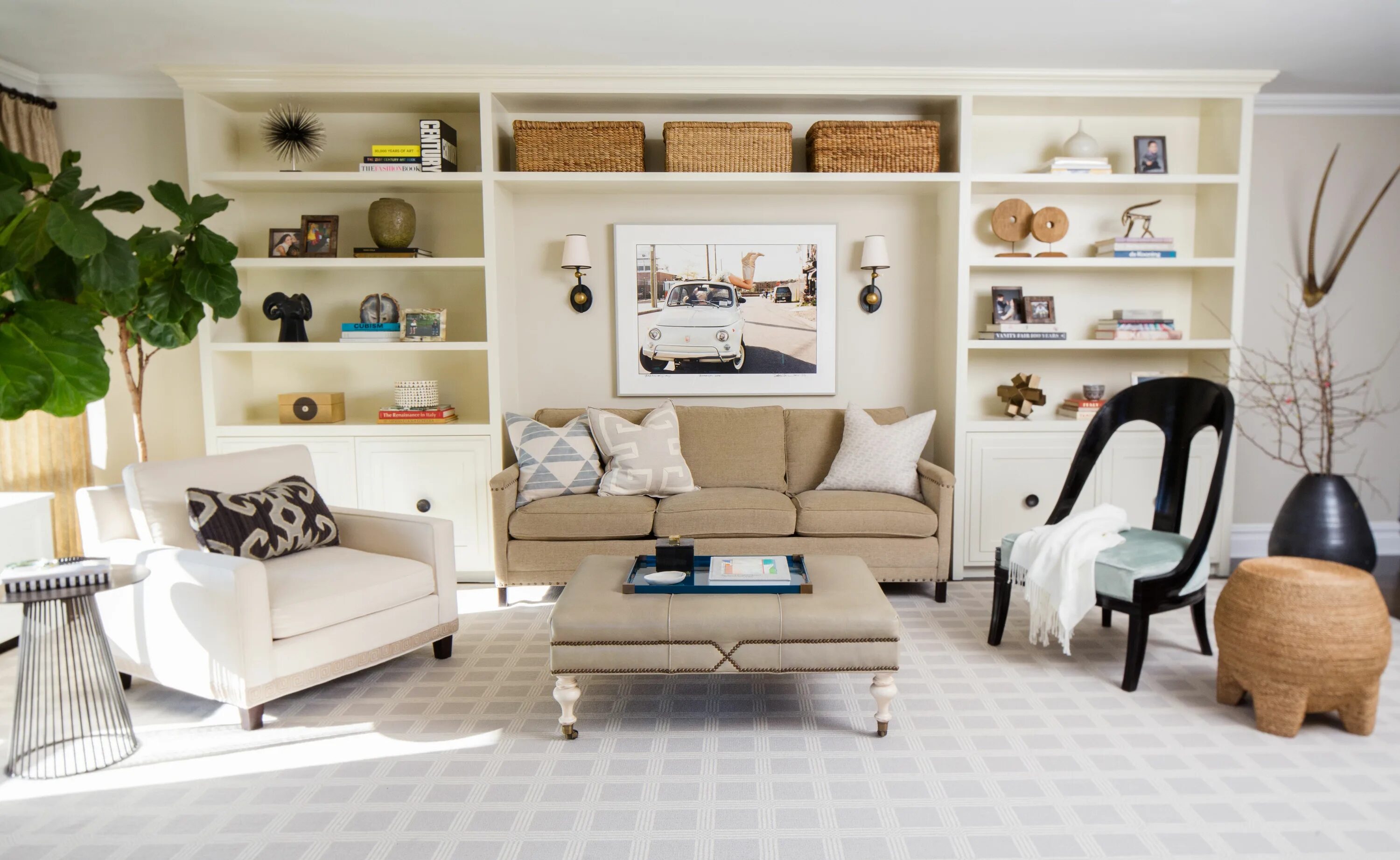 Разная мебель в интерьере Built in bookshelves provide a focal point in this Manhattan Living Room by BOWE