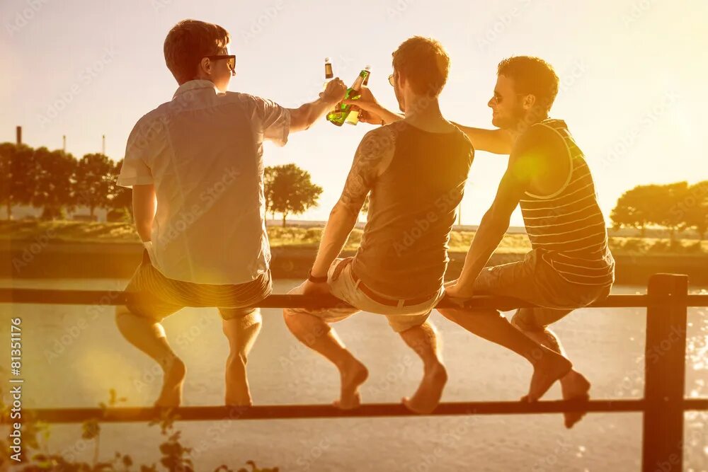 Разные хорошие фото Three friends drinking beer Фотографія Stock Adobe Stock