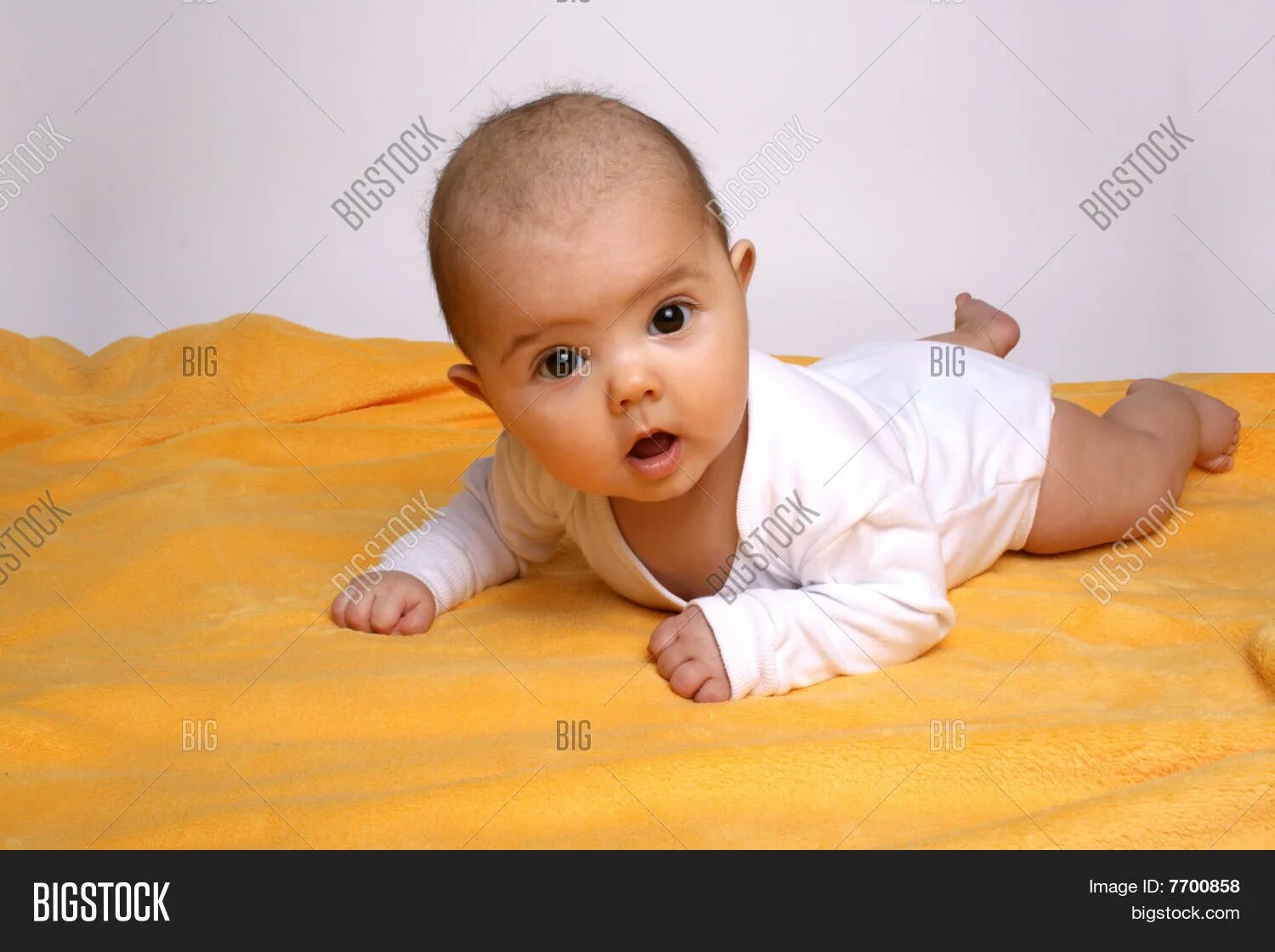 Ребенок 1 год 2 месяца фото Baby On Yellow Planket Image & Photo (Free Trial) Bigstock