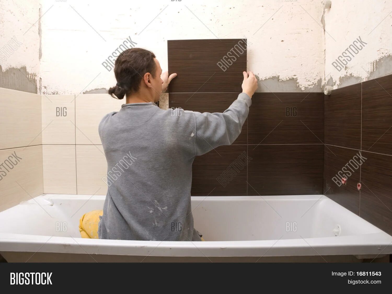 Ремонт в ванной своими руками фото Man Tiling Wall Image & Photo (Free Trial) Bigstock