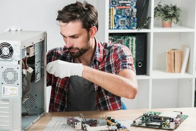 Ремонты техники своими руками Premium Photo Front view person repairing a motherboard