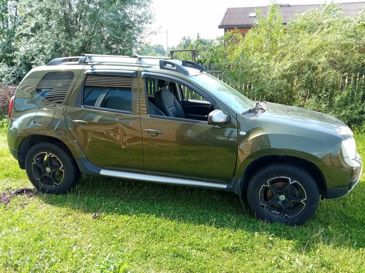 Рено дастер зеленый фото Купить б/у Renault Duster I Рестайлинг 2.0 AT (143 л.с.) 4WD бензин автомат в Мо