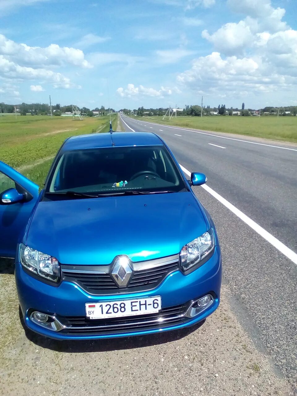 Рено фото голубой Ездили в Гомель. Часть 1 - Renault Logan (2G), 1,6 л, 2016 года путешествие DRIV