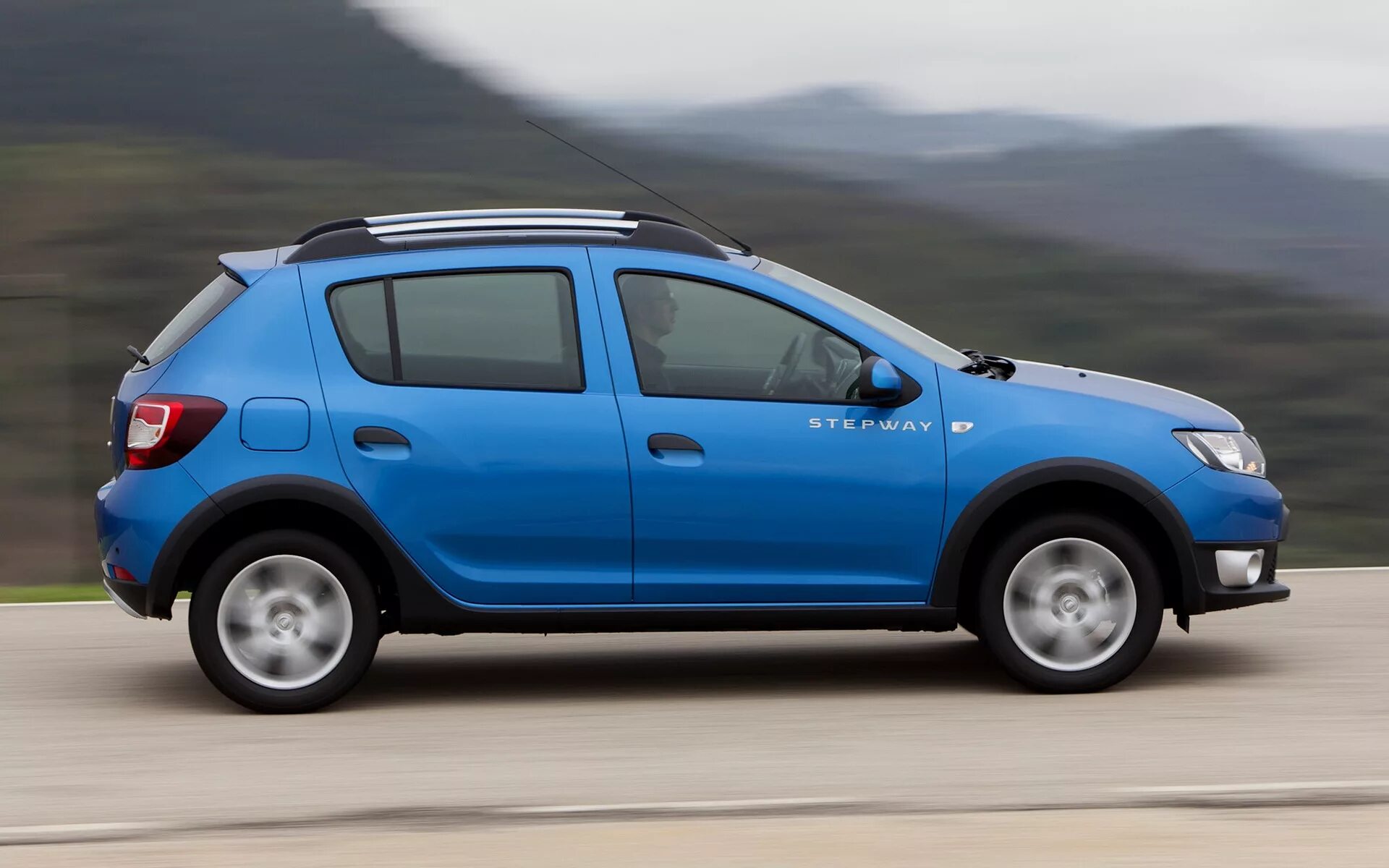 Рено фото сбоку 2012 Dacia Sandero Stepway - Wallpapers and HD Images Car Pixel