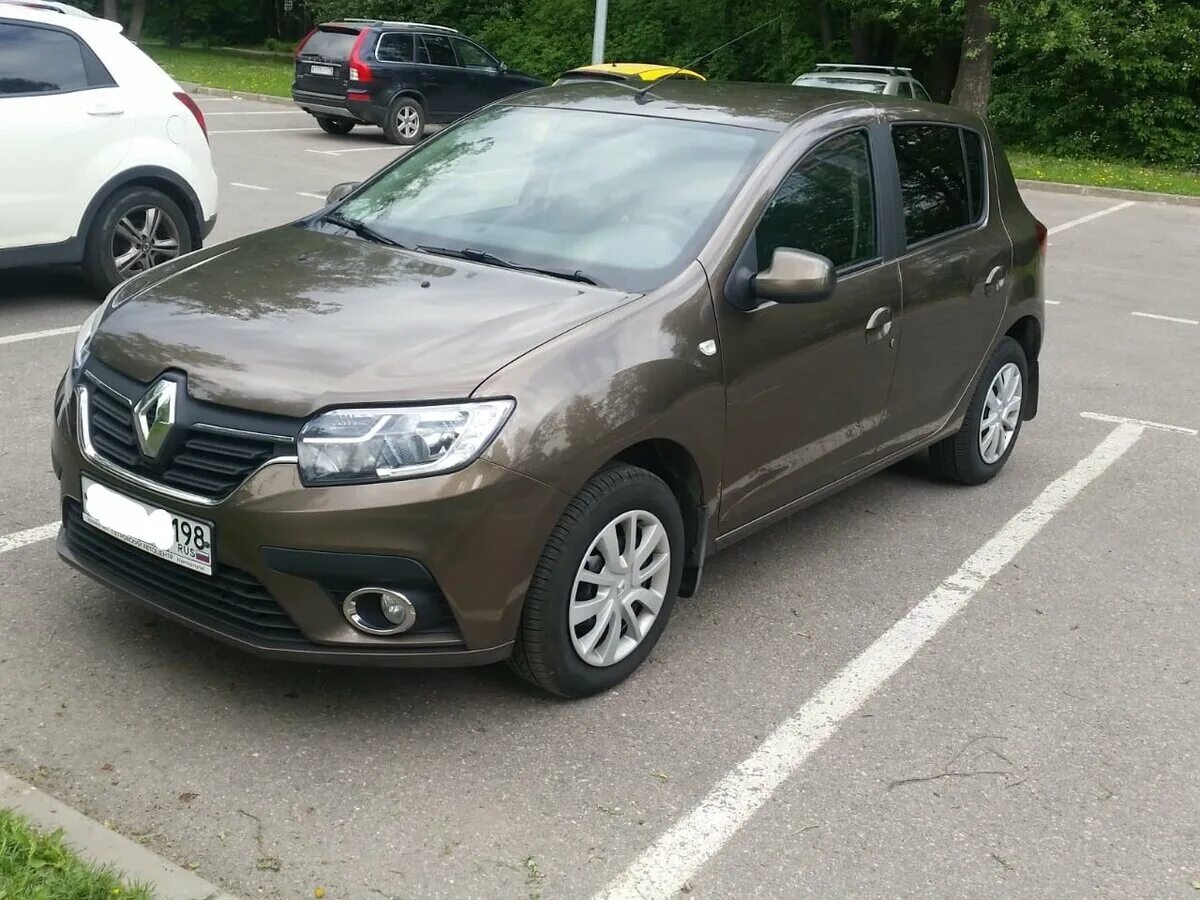 Рено логан коричневый фото Купить б/у Renault Sandero II Рестайлинг 1.6 MT (82 л.с.) бензин механика в Санк