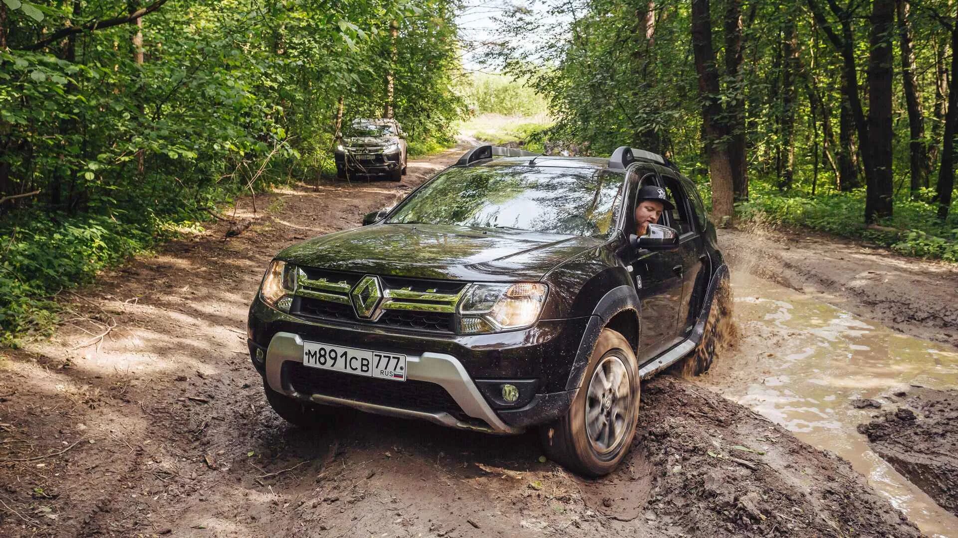 Рено паджеро фото Mitsubishi Pajero Sport против Renault Duster: тест-драйв