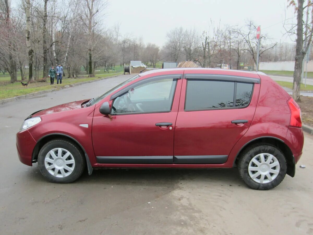 Рено сандеро 1.6 фото Купить б/у Renault Sandero I 1.6 AT (103 л.с.) бензин автомат в Москве: красный 