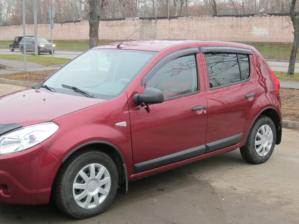 Рено сандеро 1.6 фото Купить б/у Renault Sandero I 1.6 AT (103 л.с.) бензин автомат в Москве: красный 