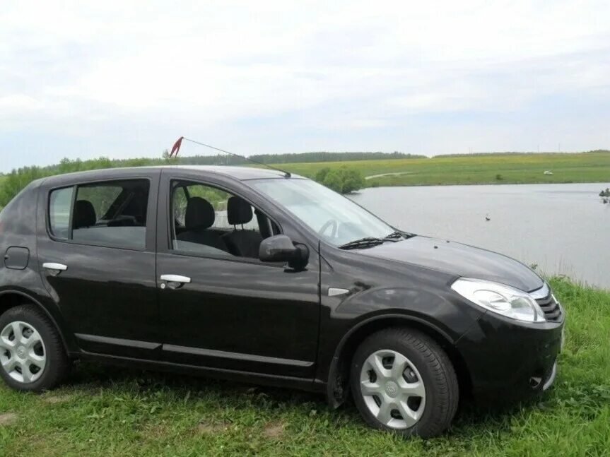 Рено сандеро черный фото Купить б/у Renault Sandero I 1.6 AT (103 л.с.) бензин автомат в Казани: чёрный Р