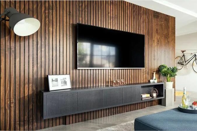 Рейки на стену под телевизор в интерьере Plywood is the perfect medium to add the warmth of timber to your home. It’s so 